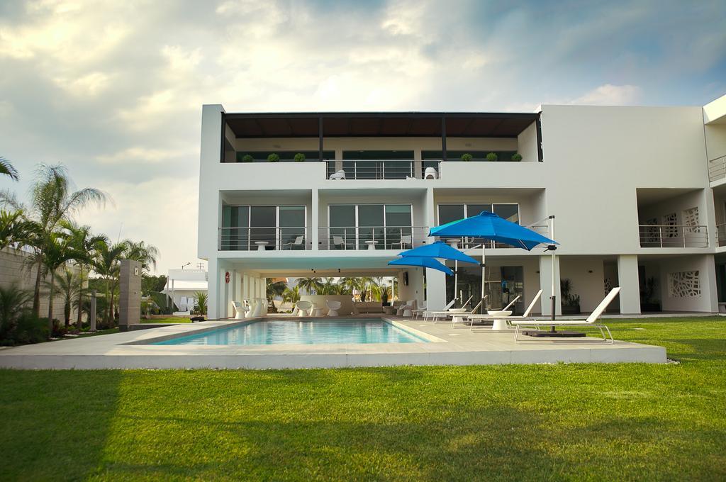 Hotel Aqua Spa & Resort มาร์ติเนซ เดอ ลา ทอเร ภายนอก รูปภาพ