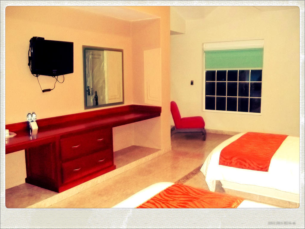 Hotel Aqua Spa & Resort มาร์ติเนซ เดอ ลา ทอเร ห้อง รูปภาพ