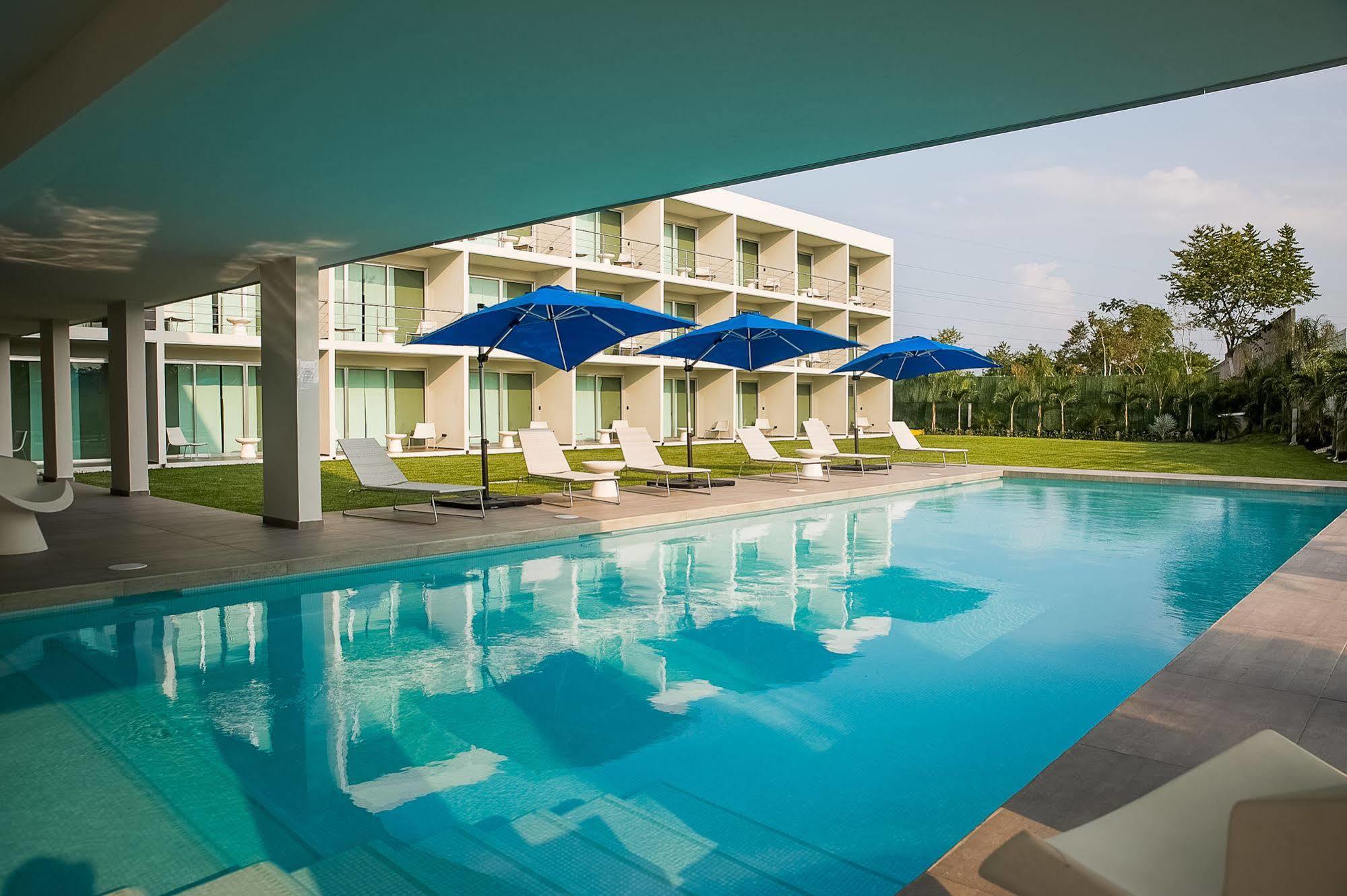 Hotel Aqua Spa & Resort มาร์ติเนซ เดอ ลา ทอเร ภายนอก รูปภาพ