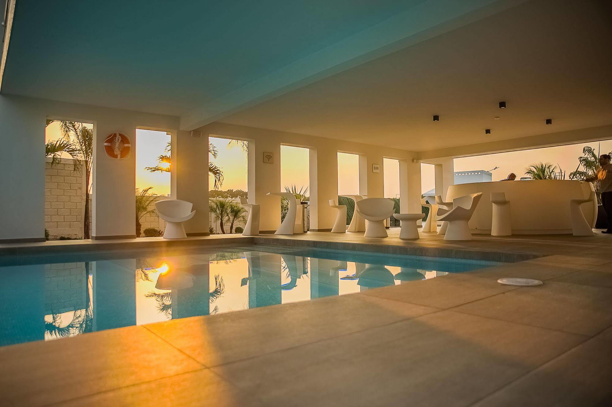 Hotel Aqua Spa & Resort มาร์ติเนซ เดอ ลา ทอเร ภายนอก รูปภาพ